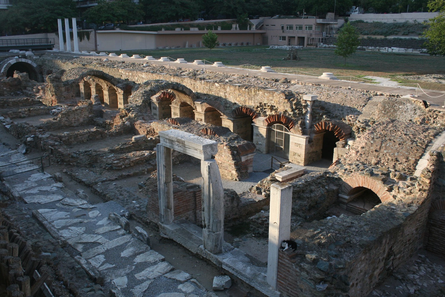 an old stone building with arches