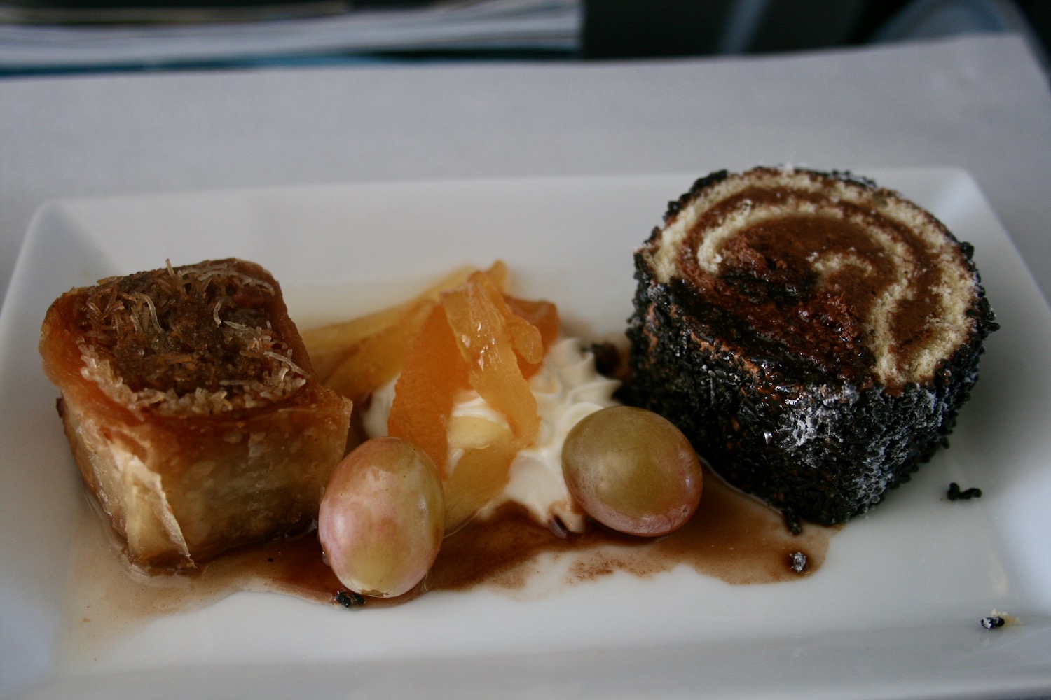 a plate of desserts on a table