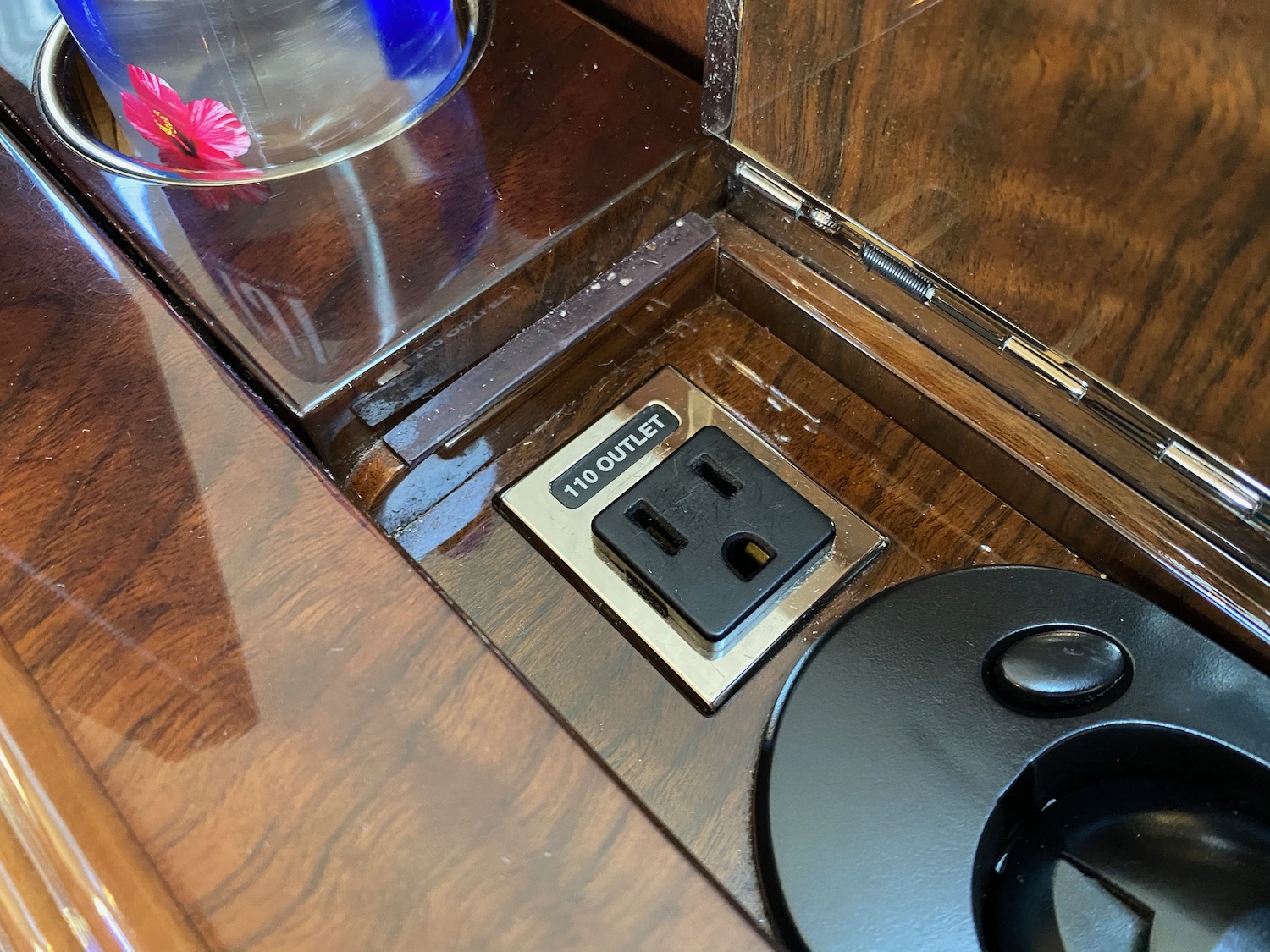 a outlet and a circular object on a table