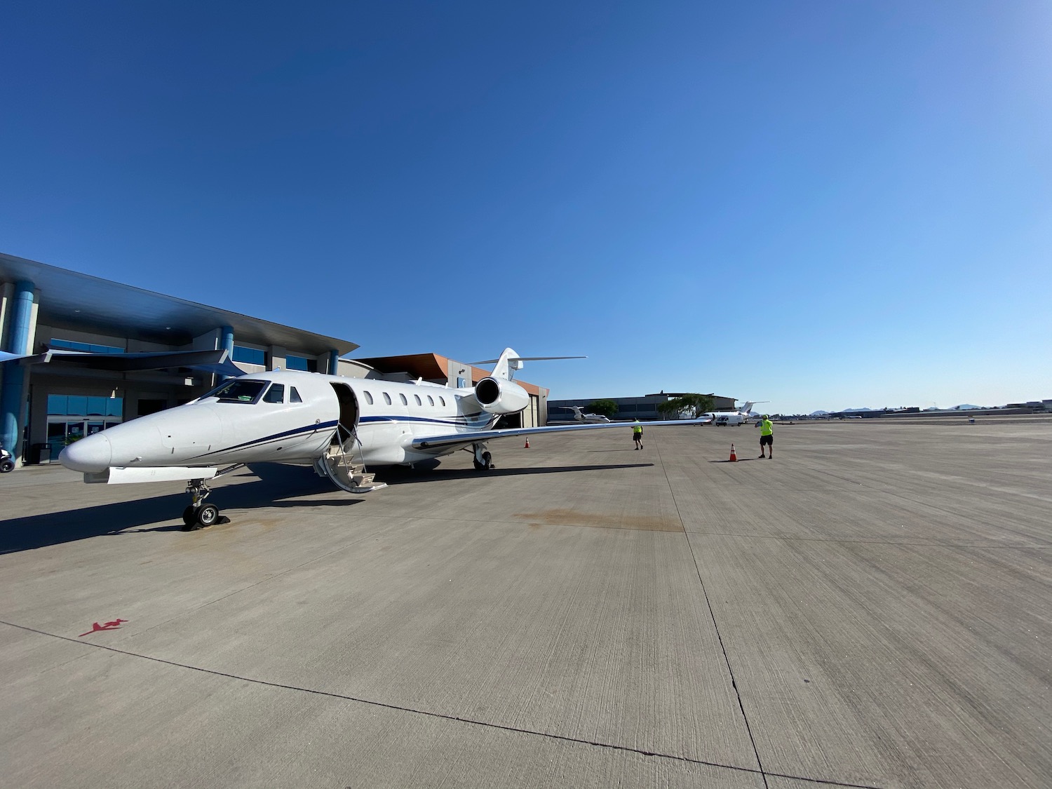 a white airplane on a tarmac