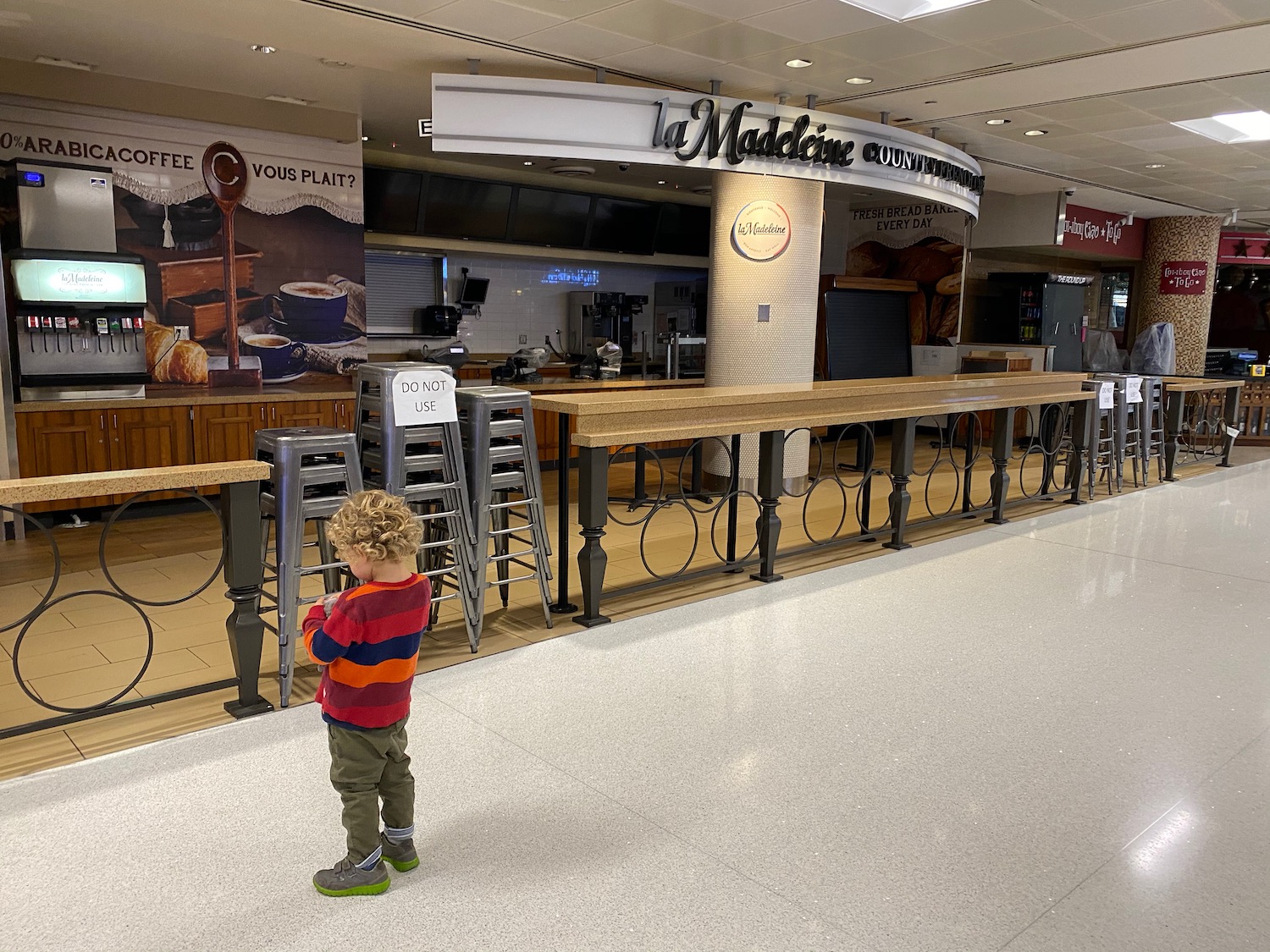 a child standing in a hallway