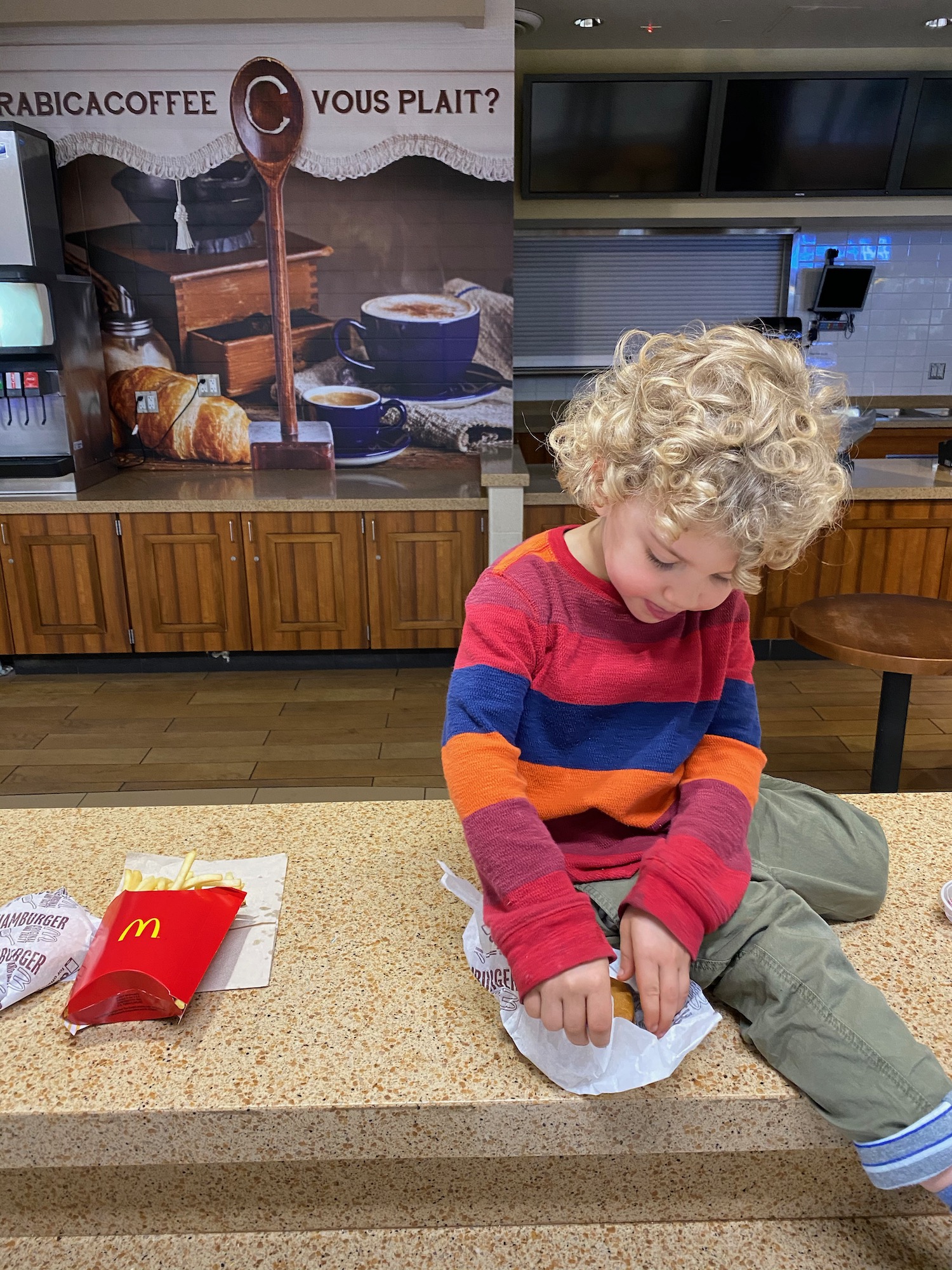 a child sitting on a counter