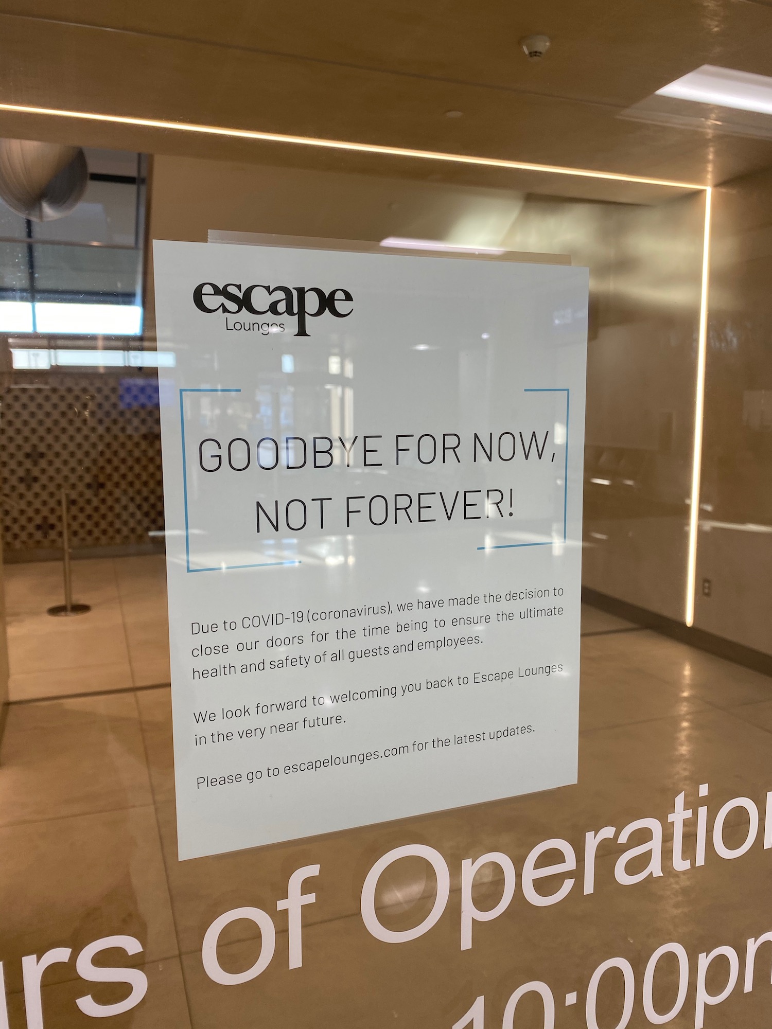 a sign on a glass wall