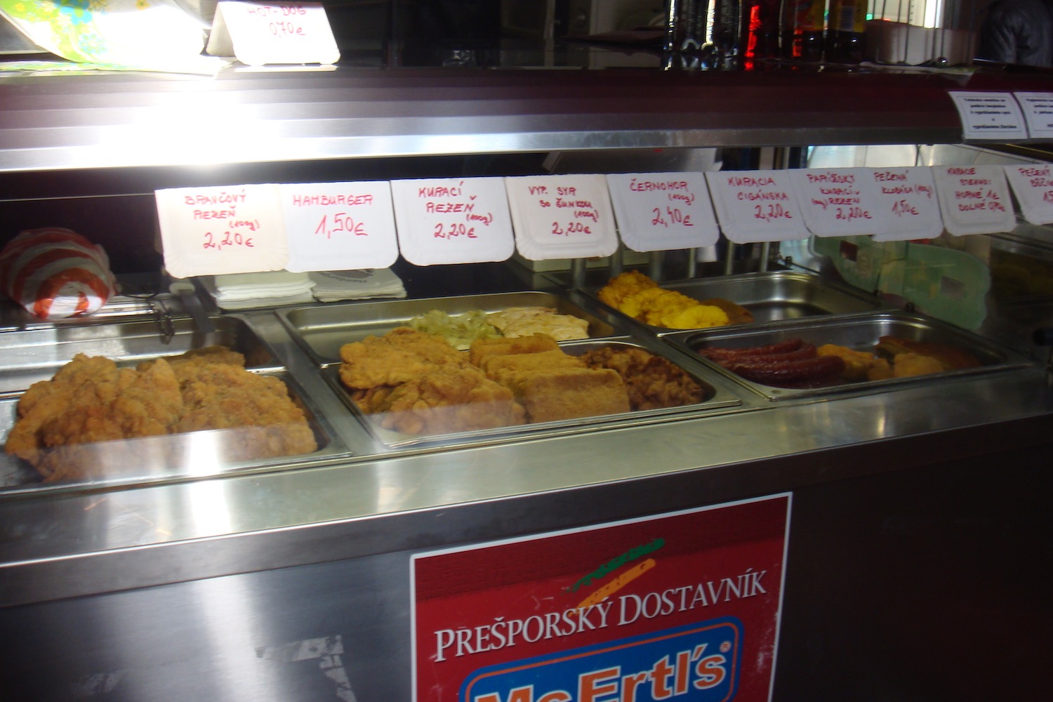 food in a restaurant with signs