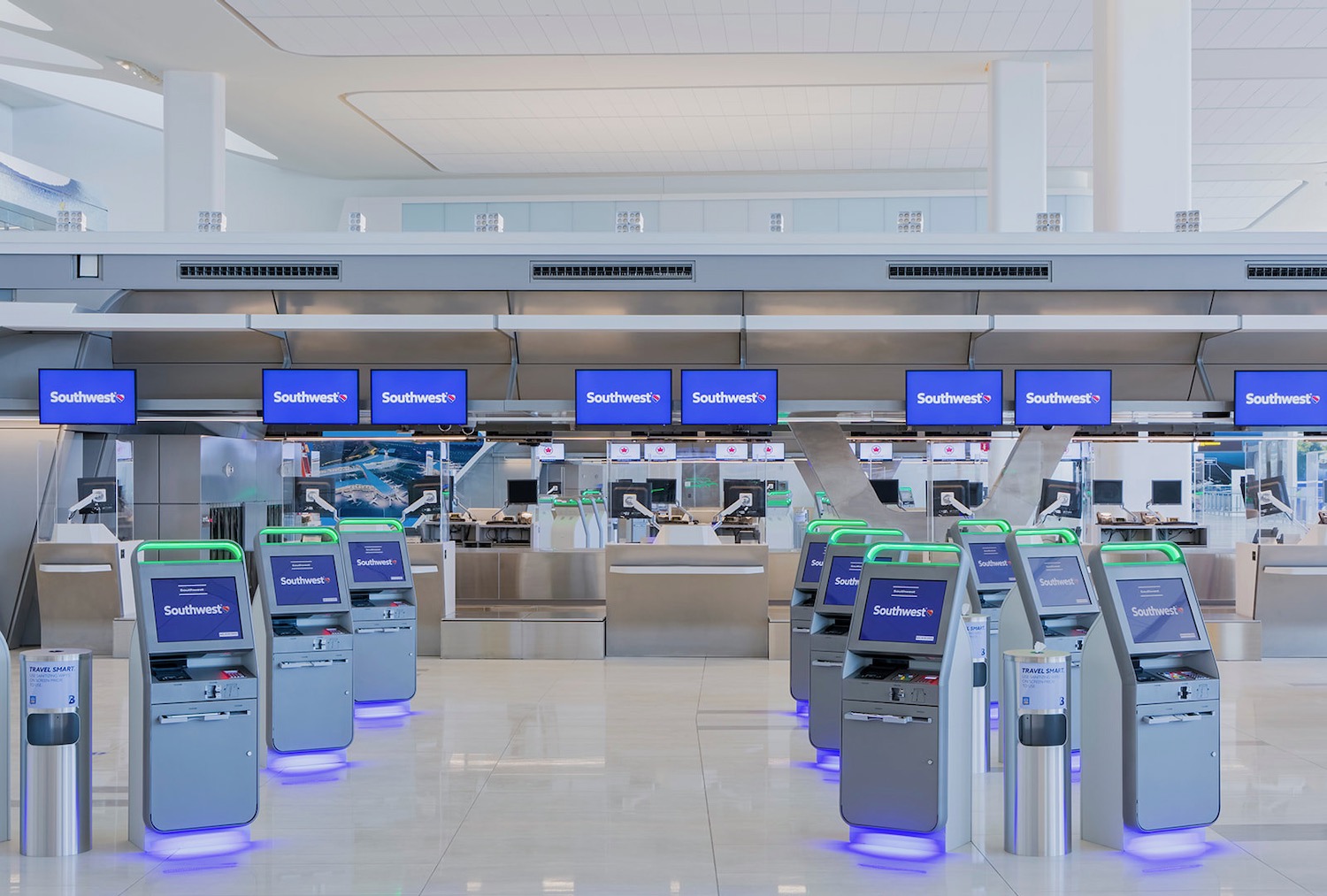 a group of kiosks in a terminal