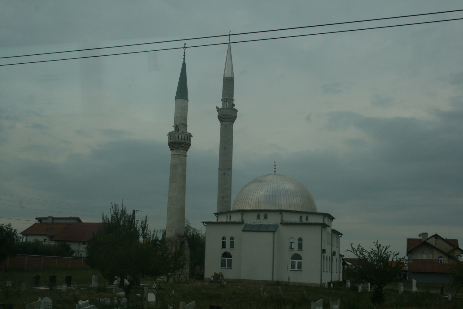 a building with towers in the background