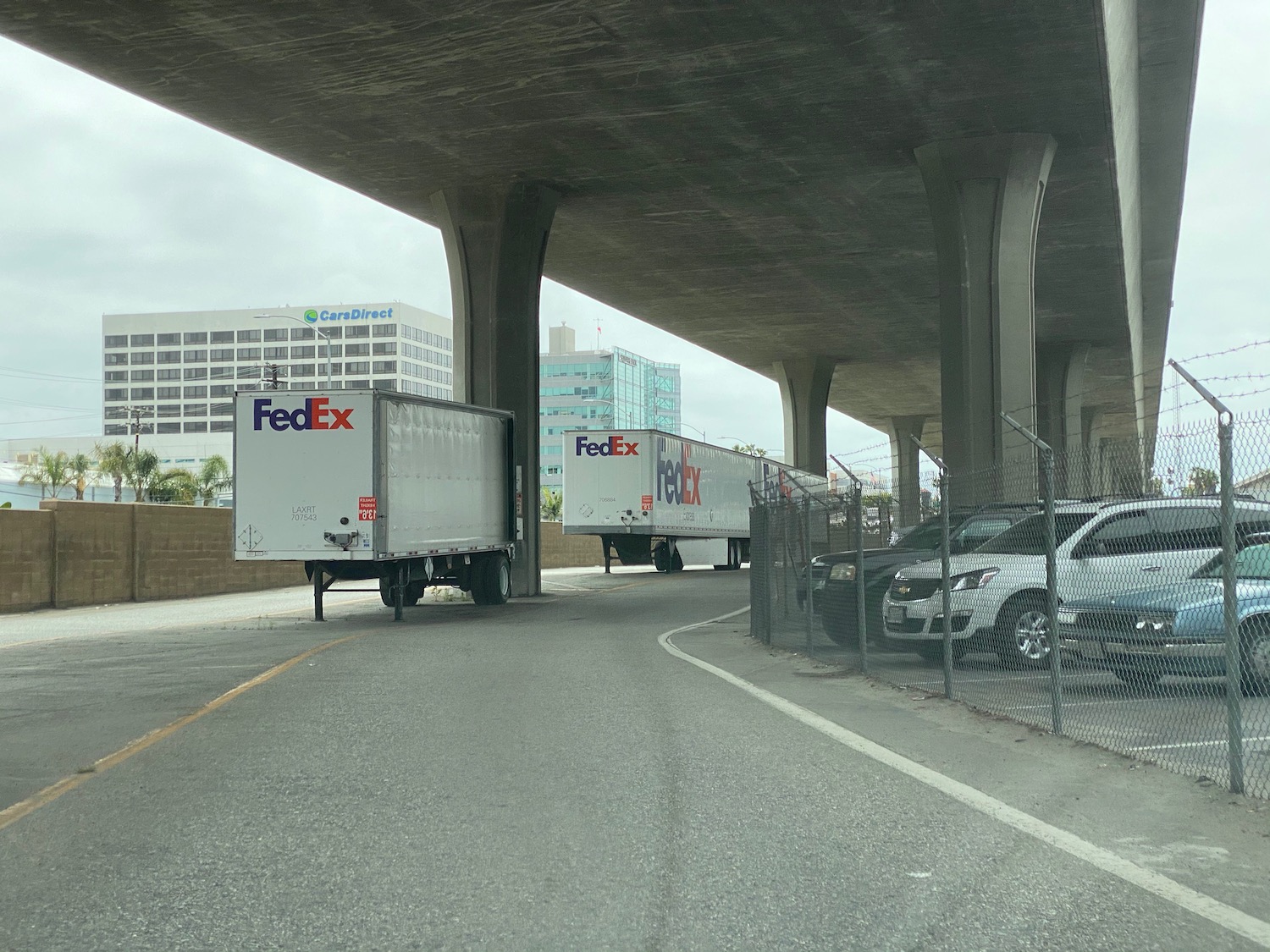 a truck parked under a bridge
