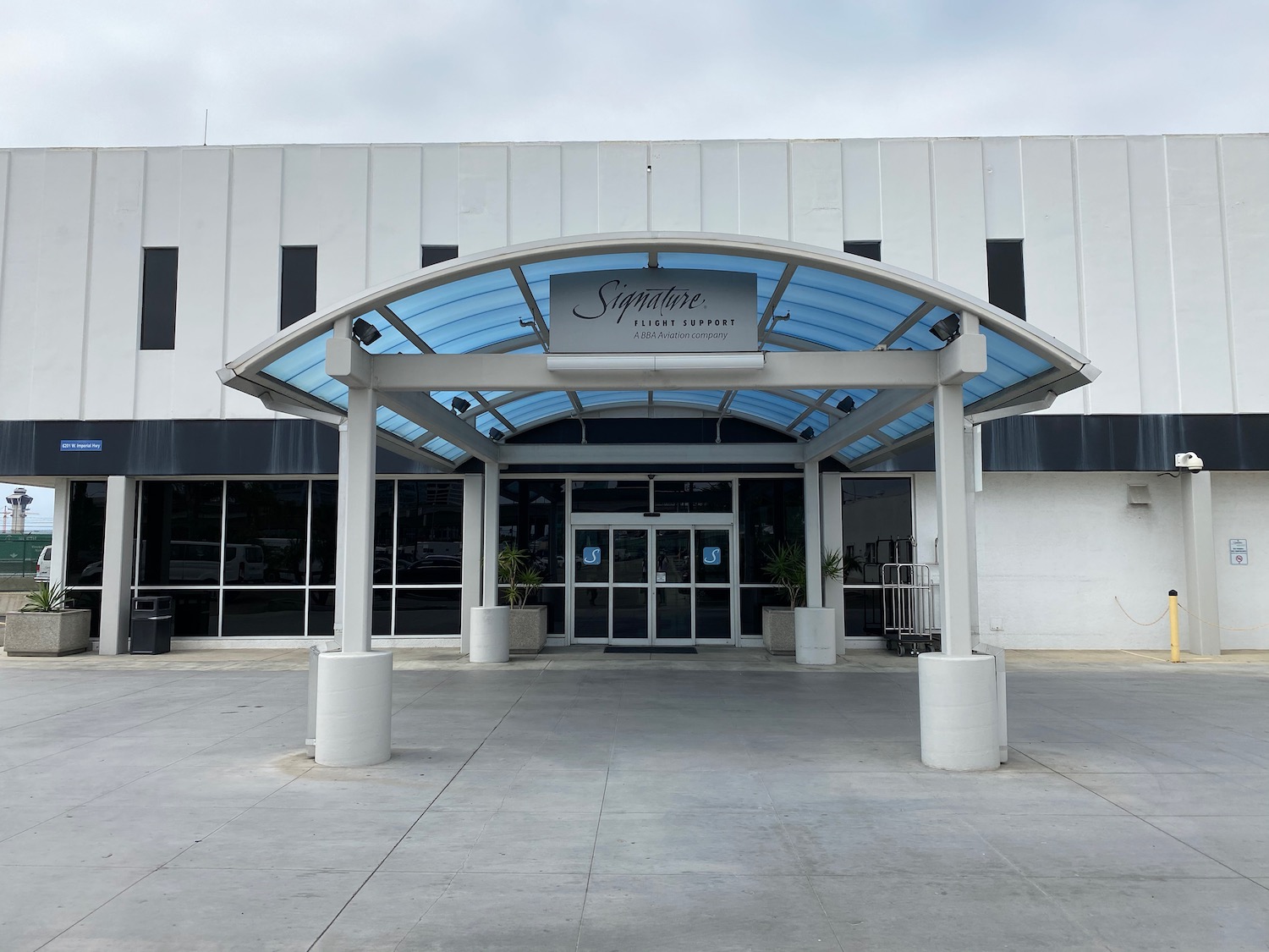 a building with glass doors and a glass roof