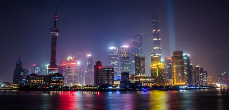 The Bund skyline with lights and a body of water