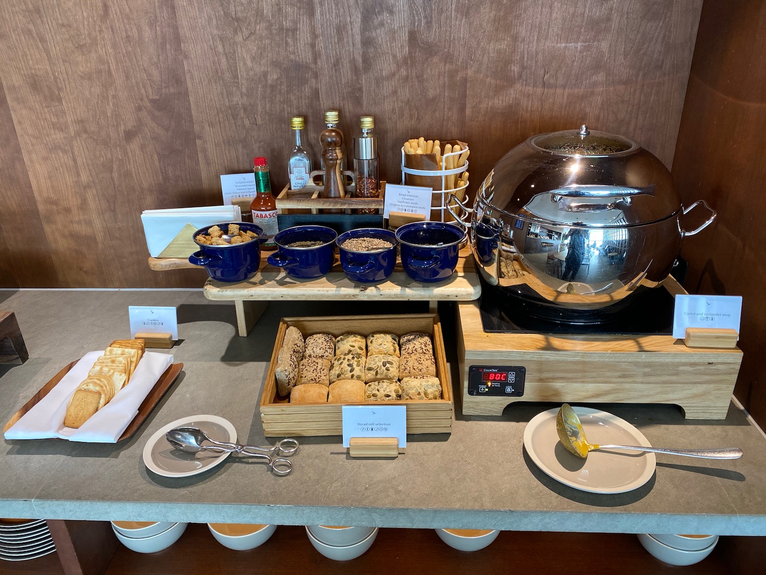 a buffet table with food items on it