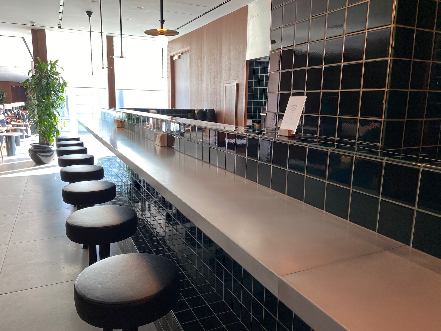 a row of stools in a restaurant