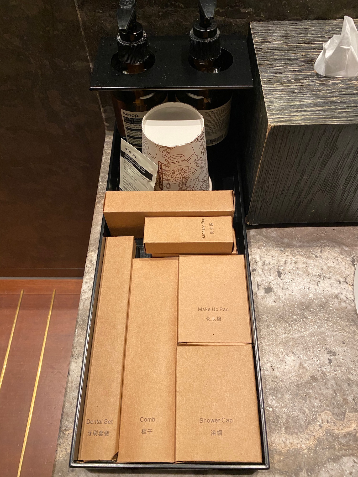 a box with brown boxes and bottles