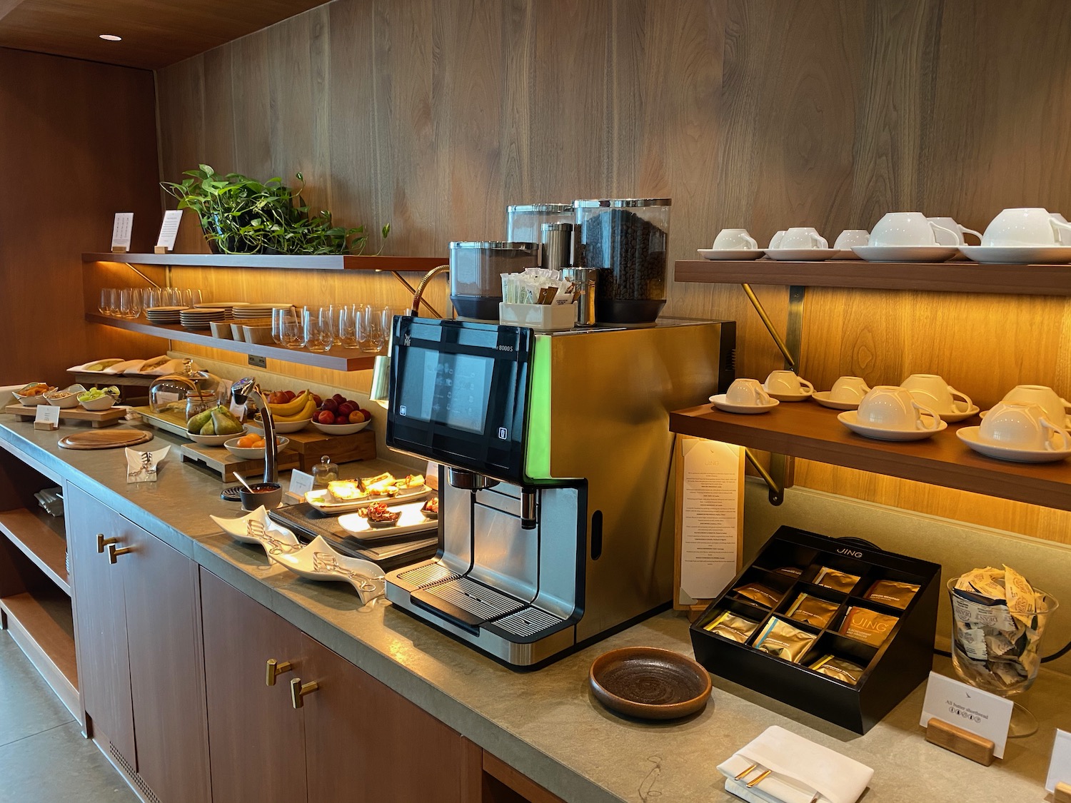 a coffee machine and food on a counter