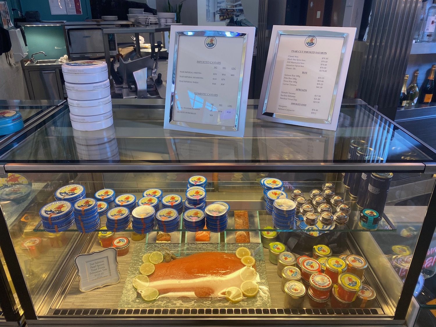 a display case with food and menus