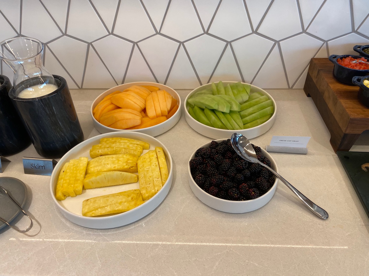 a group of bowls of fruit