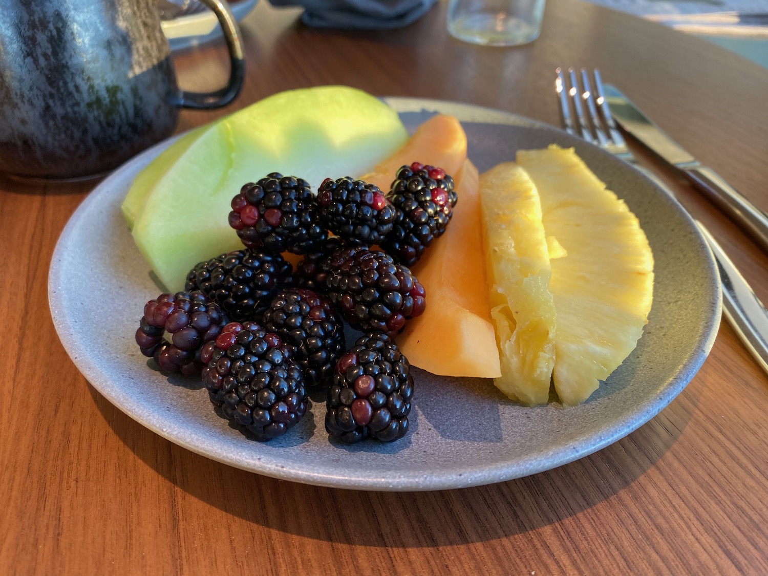 a plate of fruit on a table