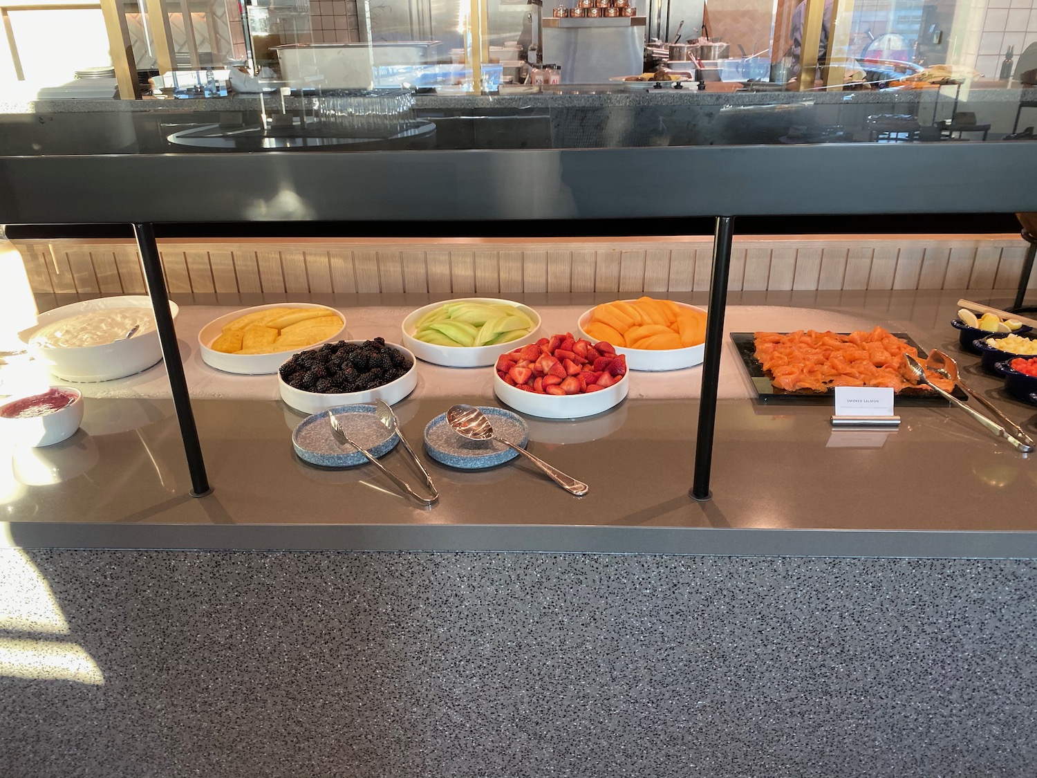 a buffet table with different types of fruit