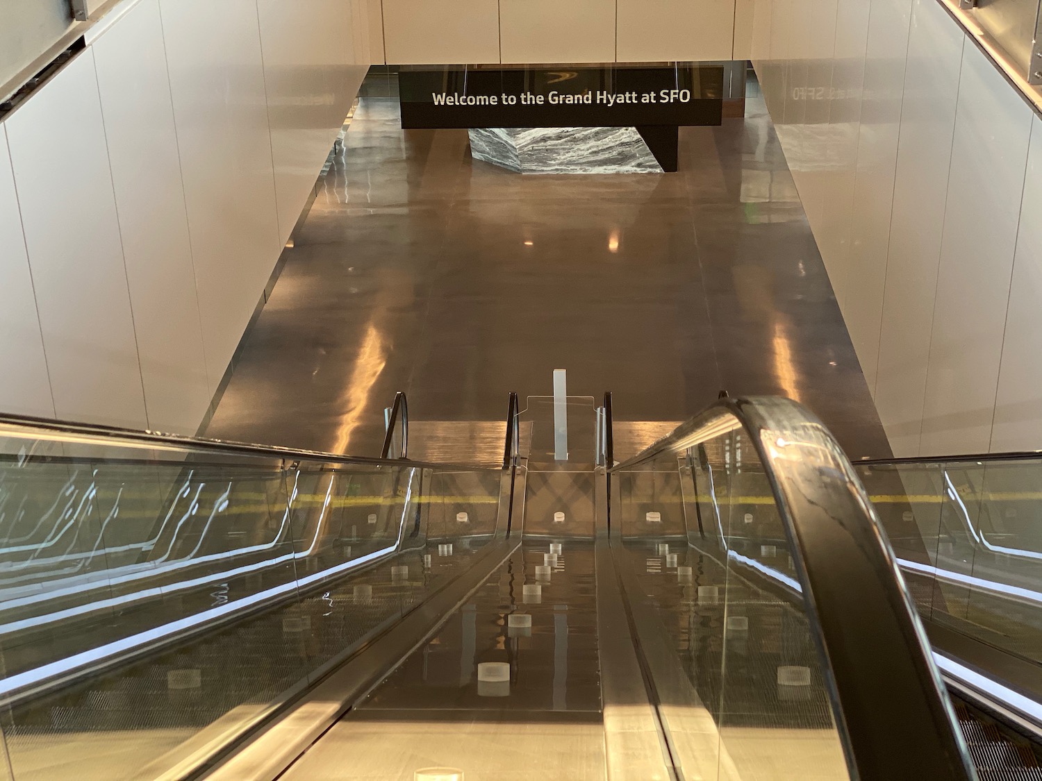 a escalator going up to a building
