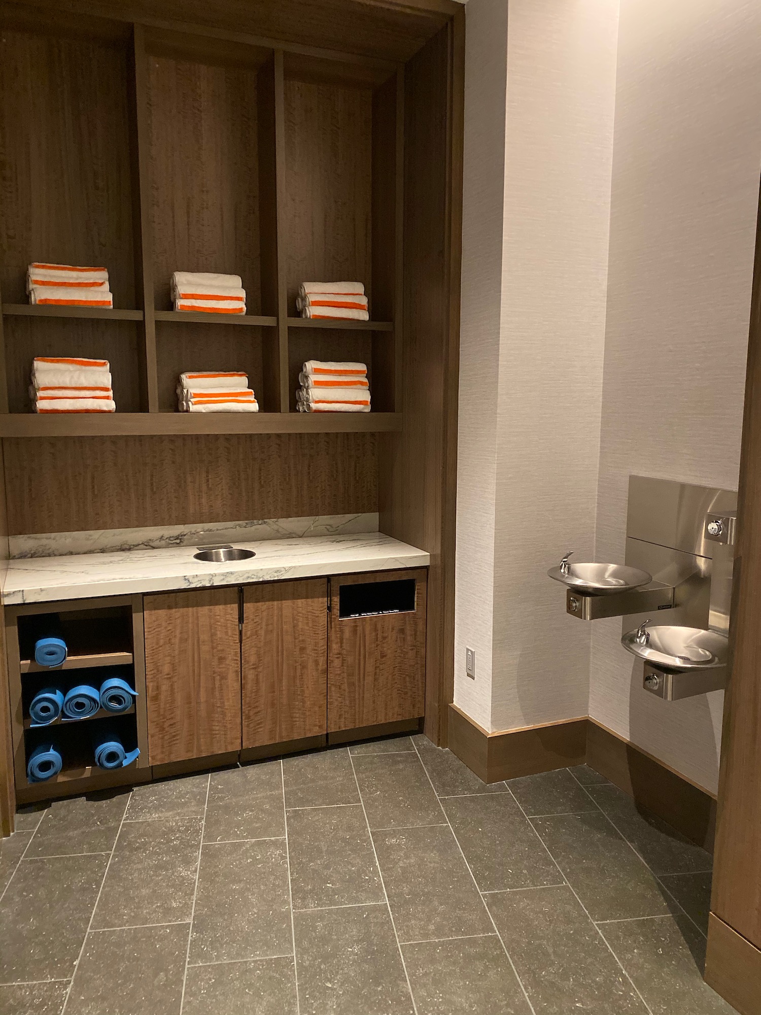 a bathroom with a sink and towels