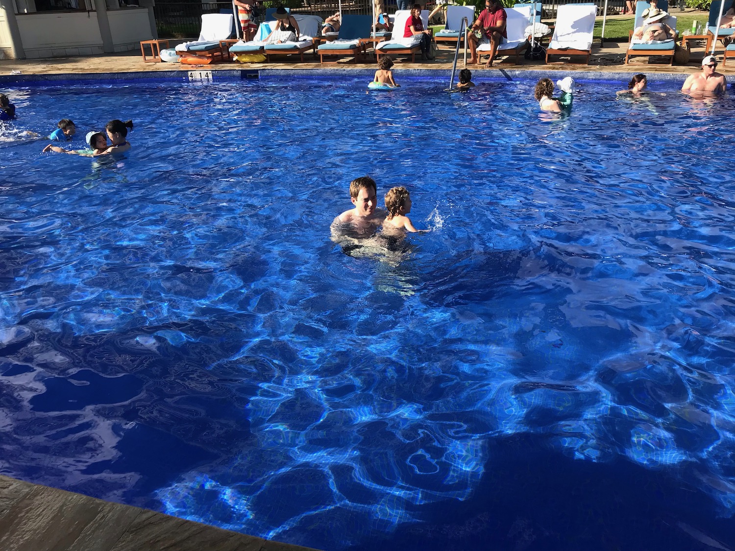 a group of people in a pool