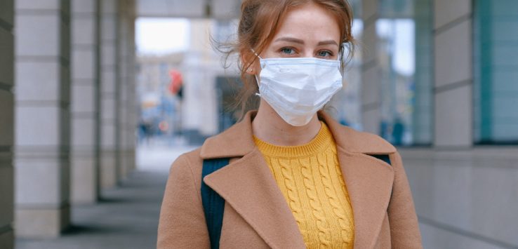 a woman wearing a face mask