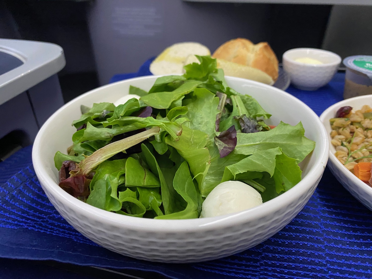 a bowl of salad on a table