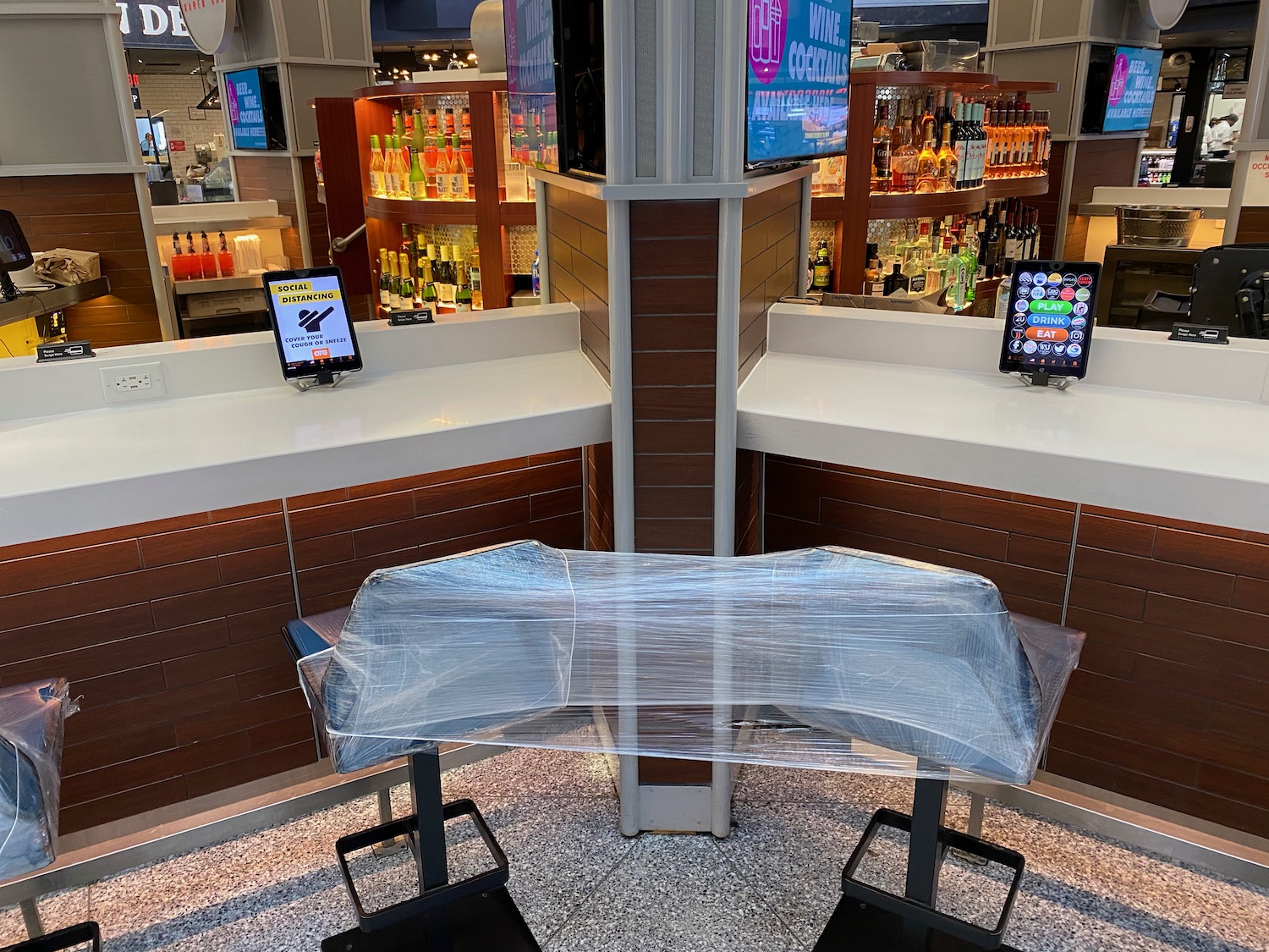 a bar with a plastic wrap around a table