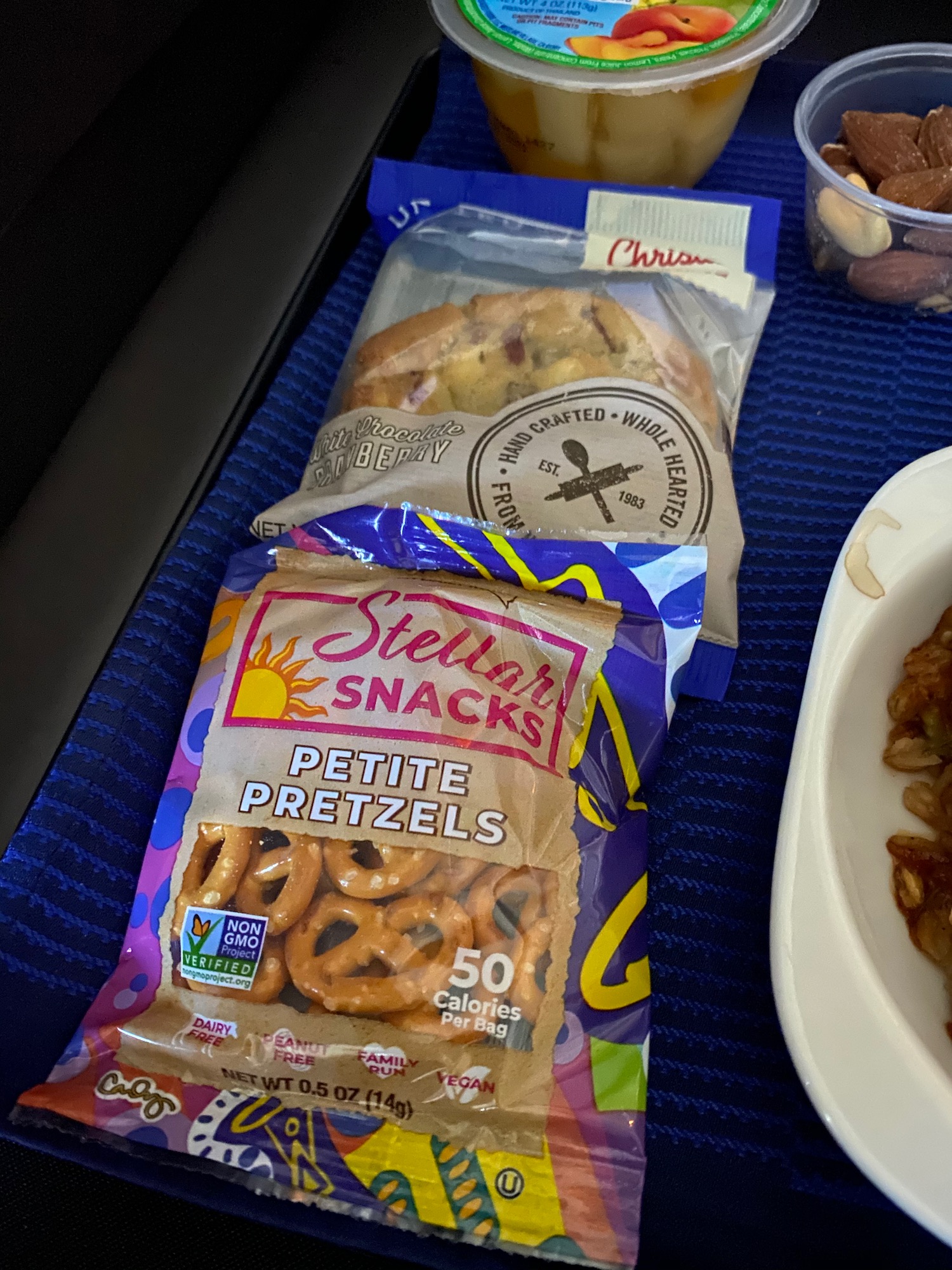 a bag of pretzels on a blue mat