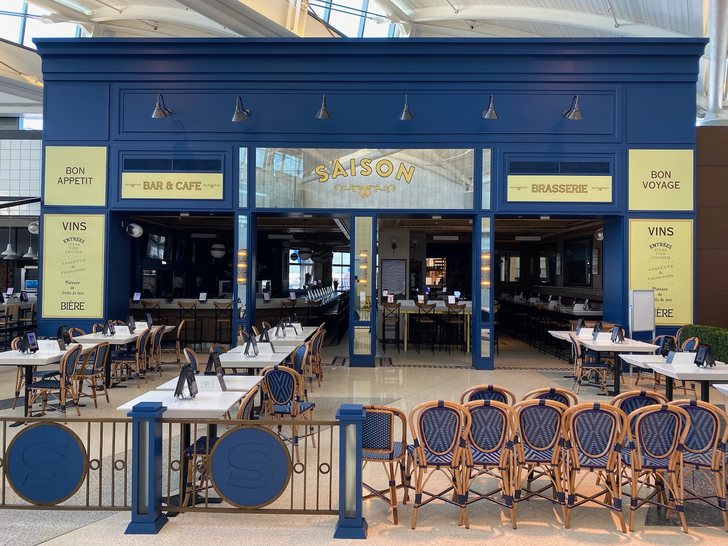 a restaurant with tables and chairs