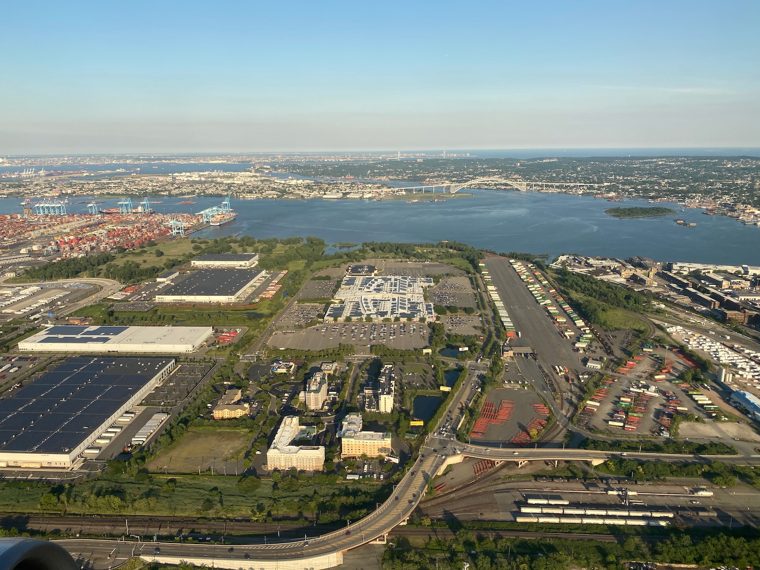 an aerial view of a city and water