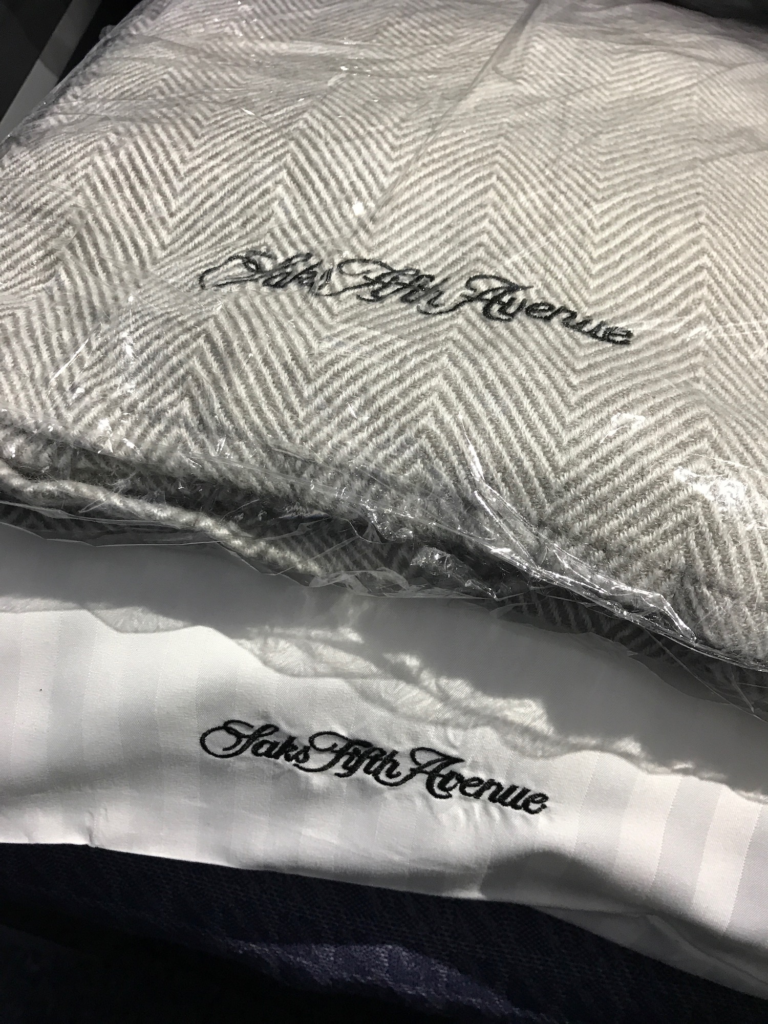 United Trims Saks Fifth Avenue Bedding Onboard Live and Let's Fly