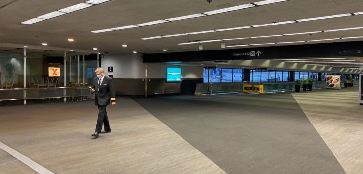 a man walking in an airport