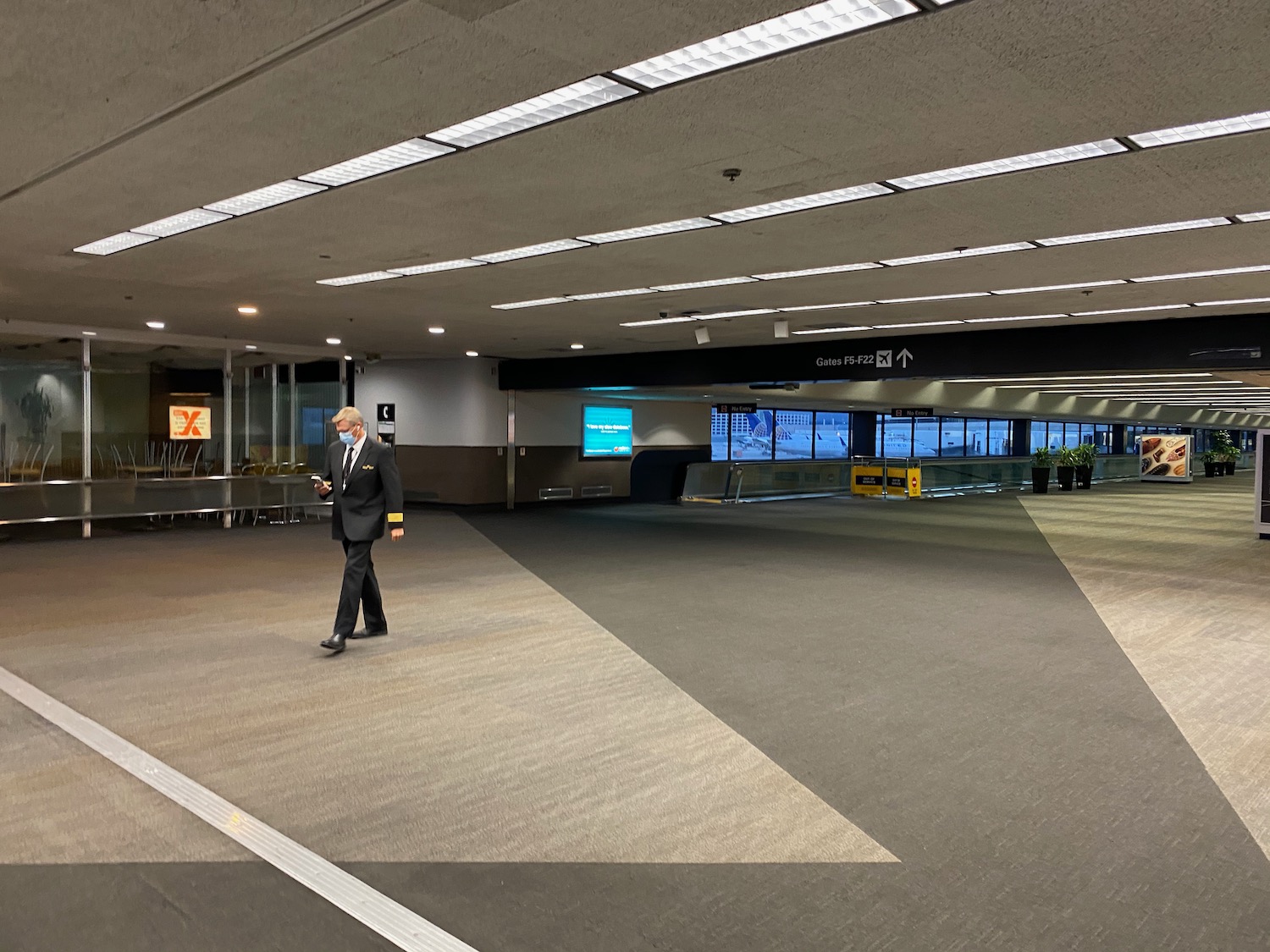 a man walking in an airport