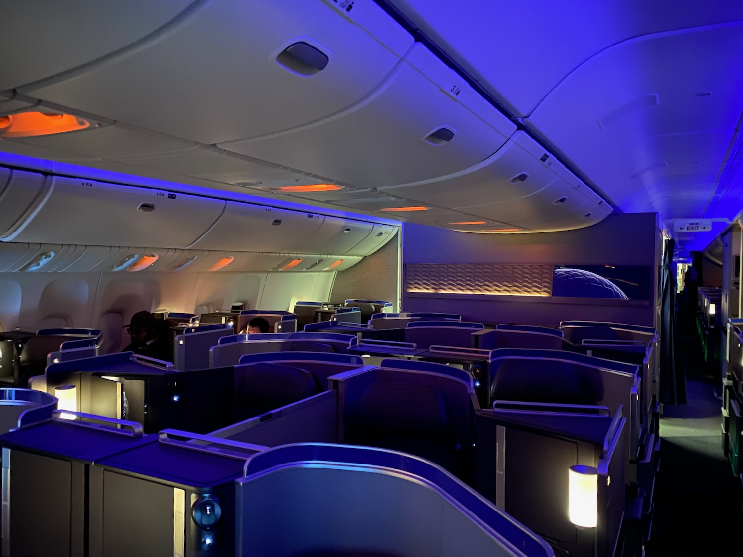 an airplane with seats and a blue light