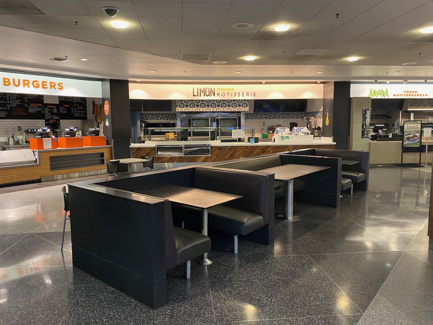 a restaurant with tables and chairs