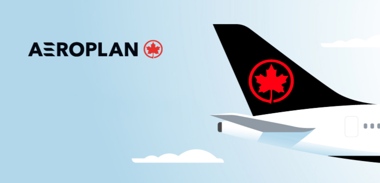 a plane tail fin with a canadian flag and a logo