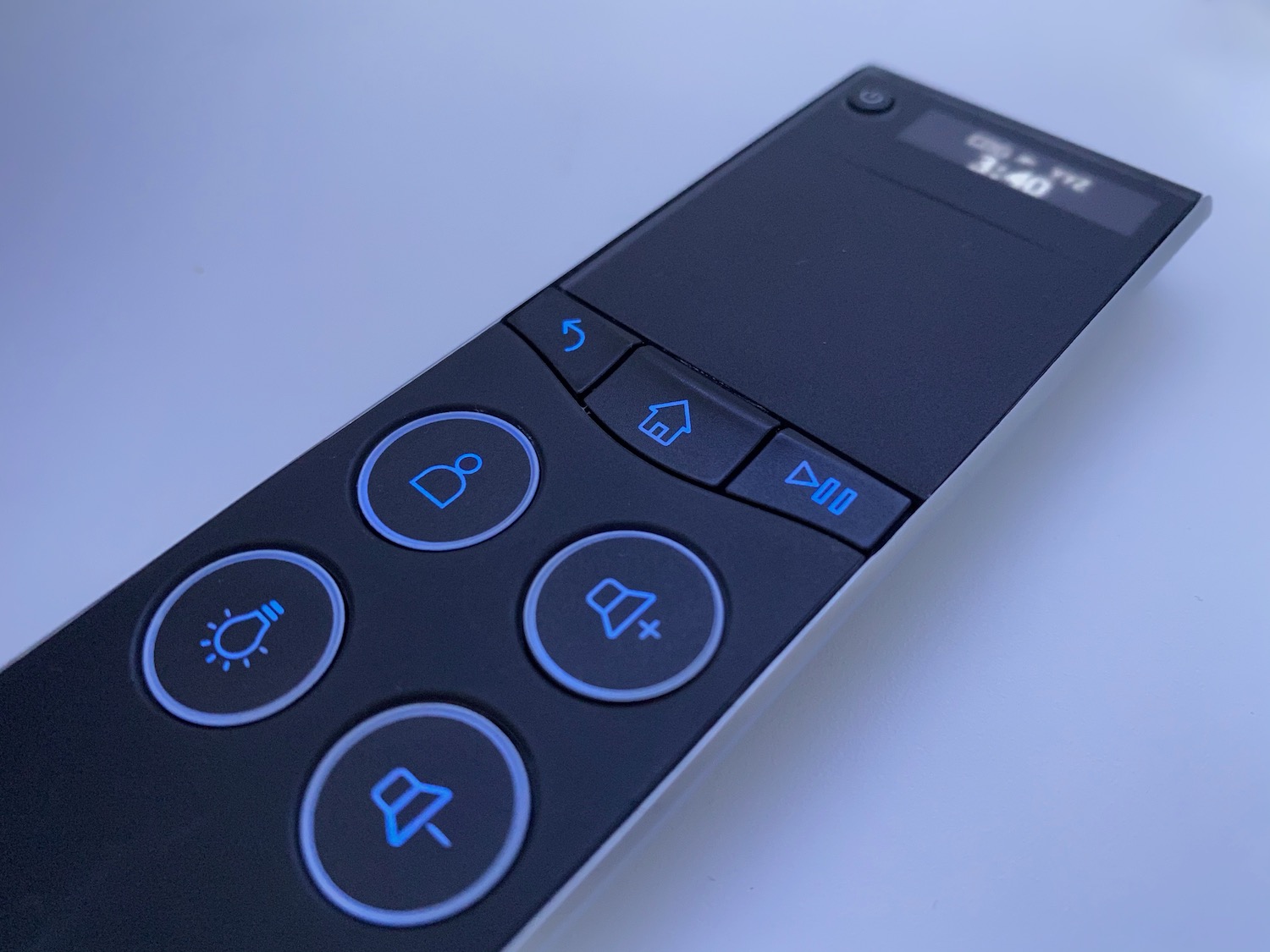 a remote control with blue lights