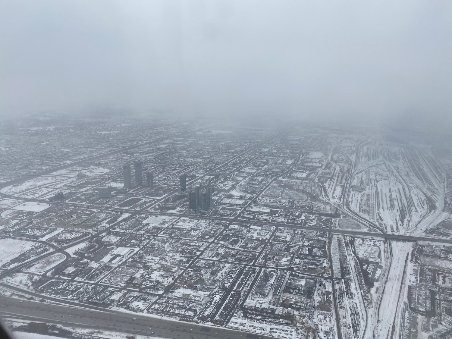 aerial view of a city with snow