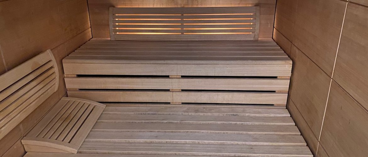 a wooden bench in a sauna