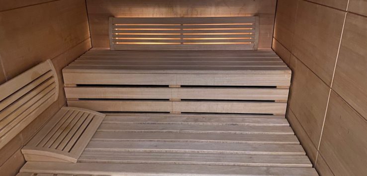 a wooden bench in a sauna