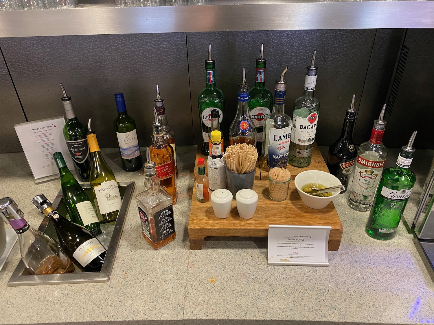 a group of bottles of alcohol on a table