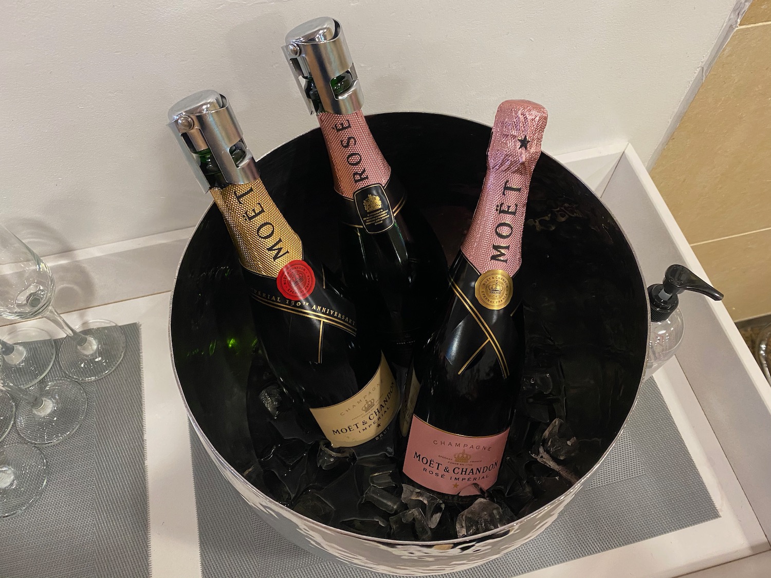 a group of champagne bottles in a bucket