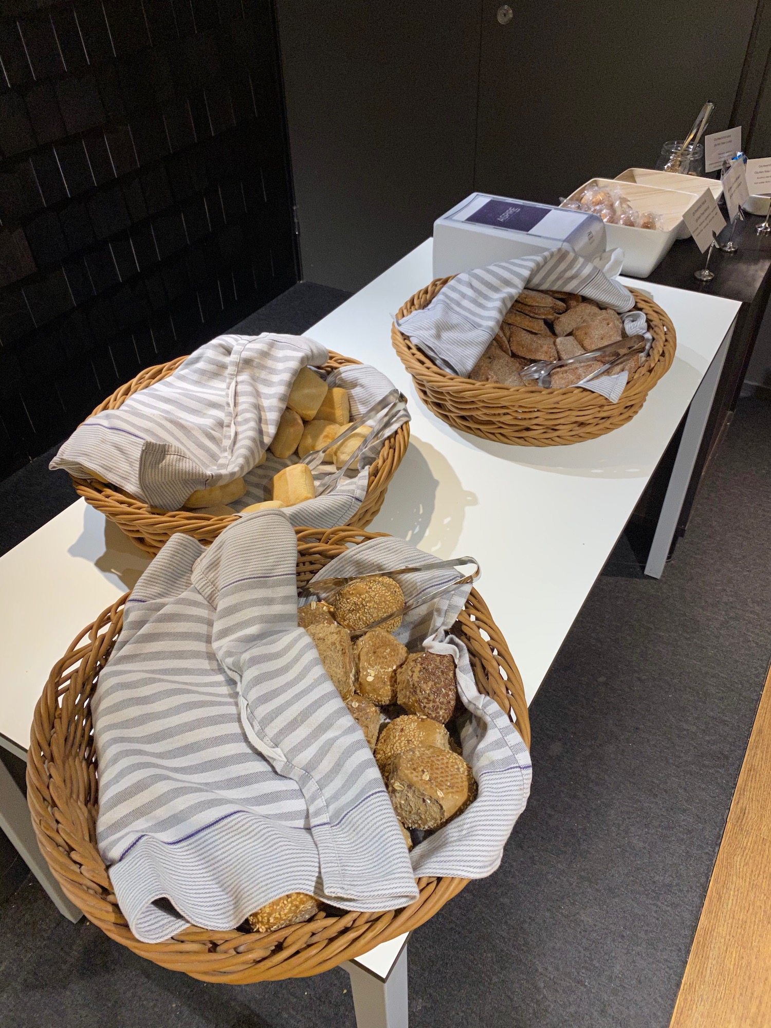 baskets of bread and cookies on a table