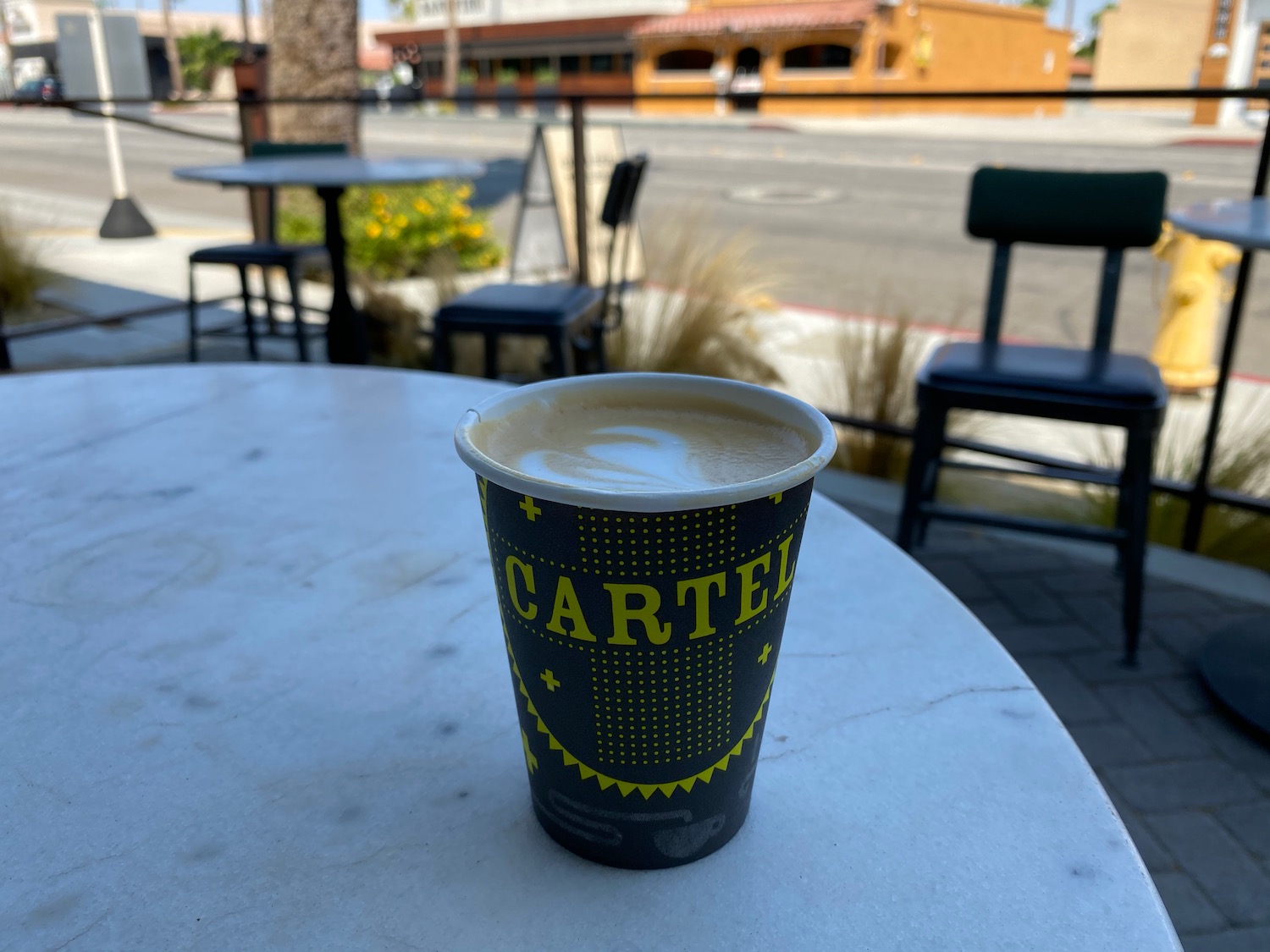 a cup of coffee on a table