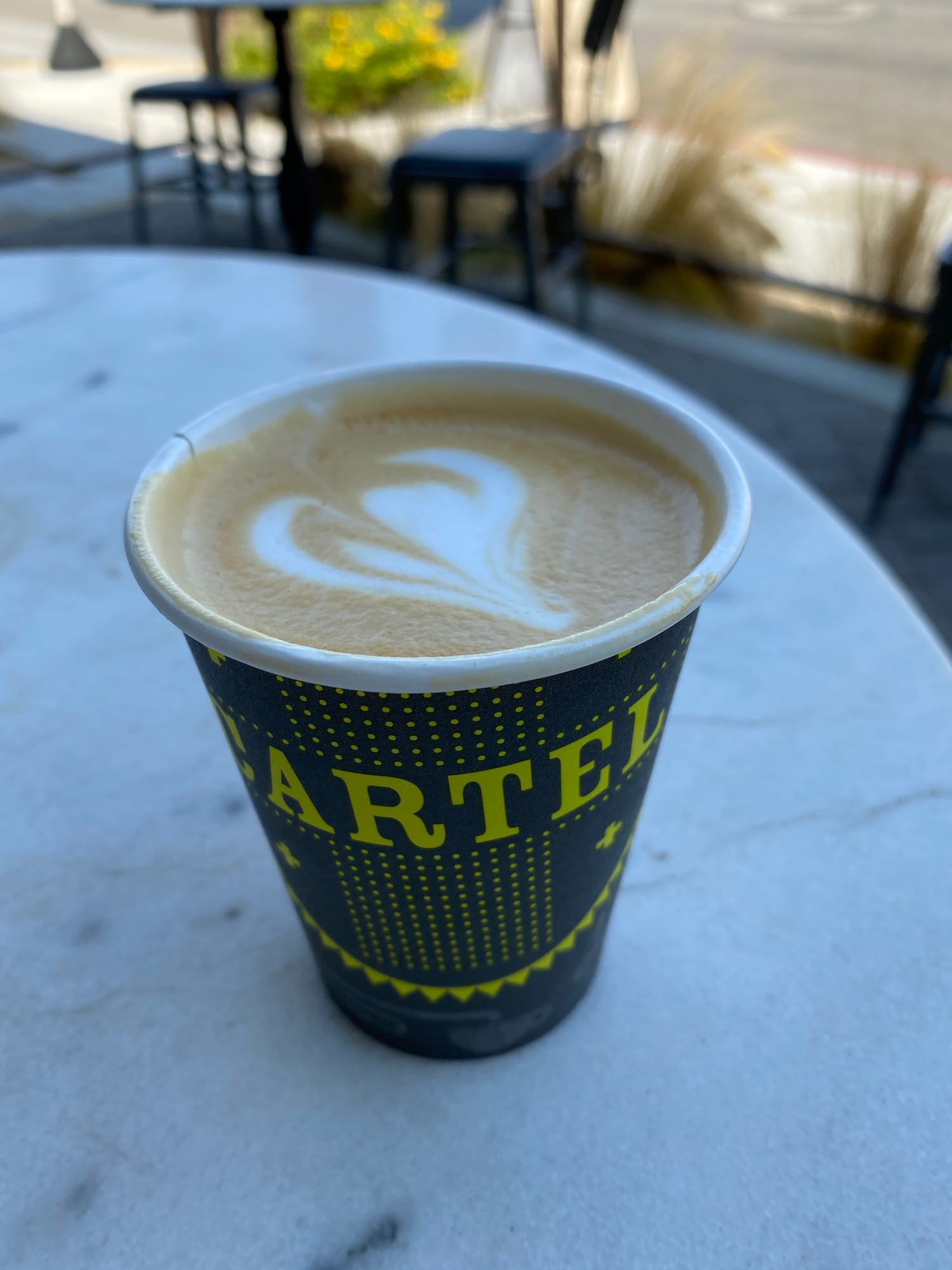 a cup of coffee on a table