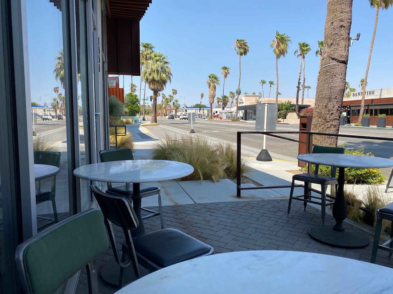 a table and chairs outside of a restaurant