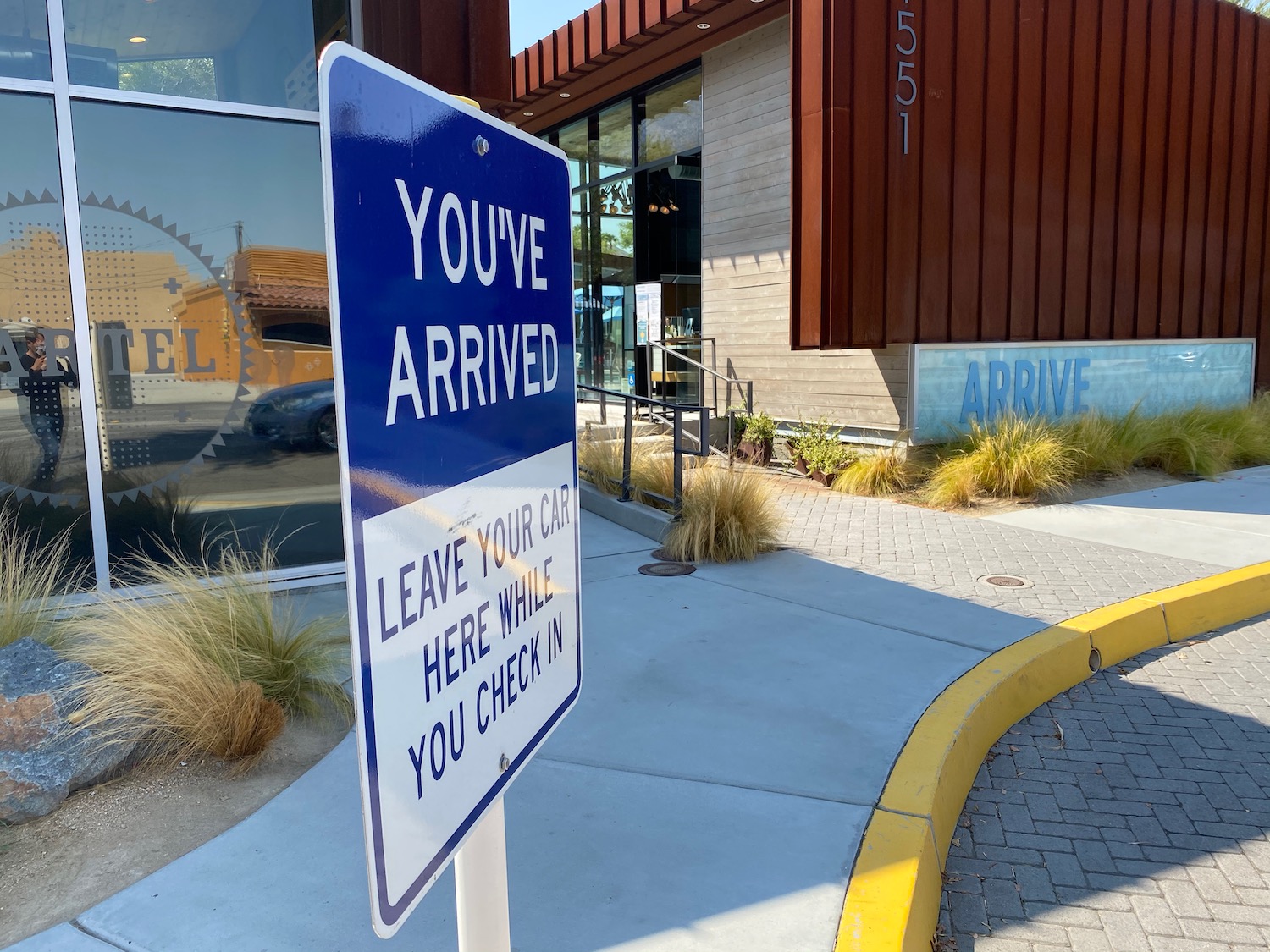 a sign on the sidewalk