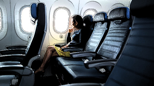 a woman sitting in an airplane