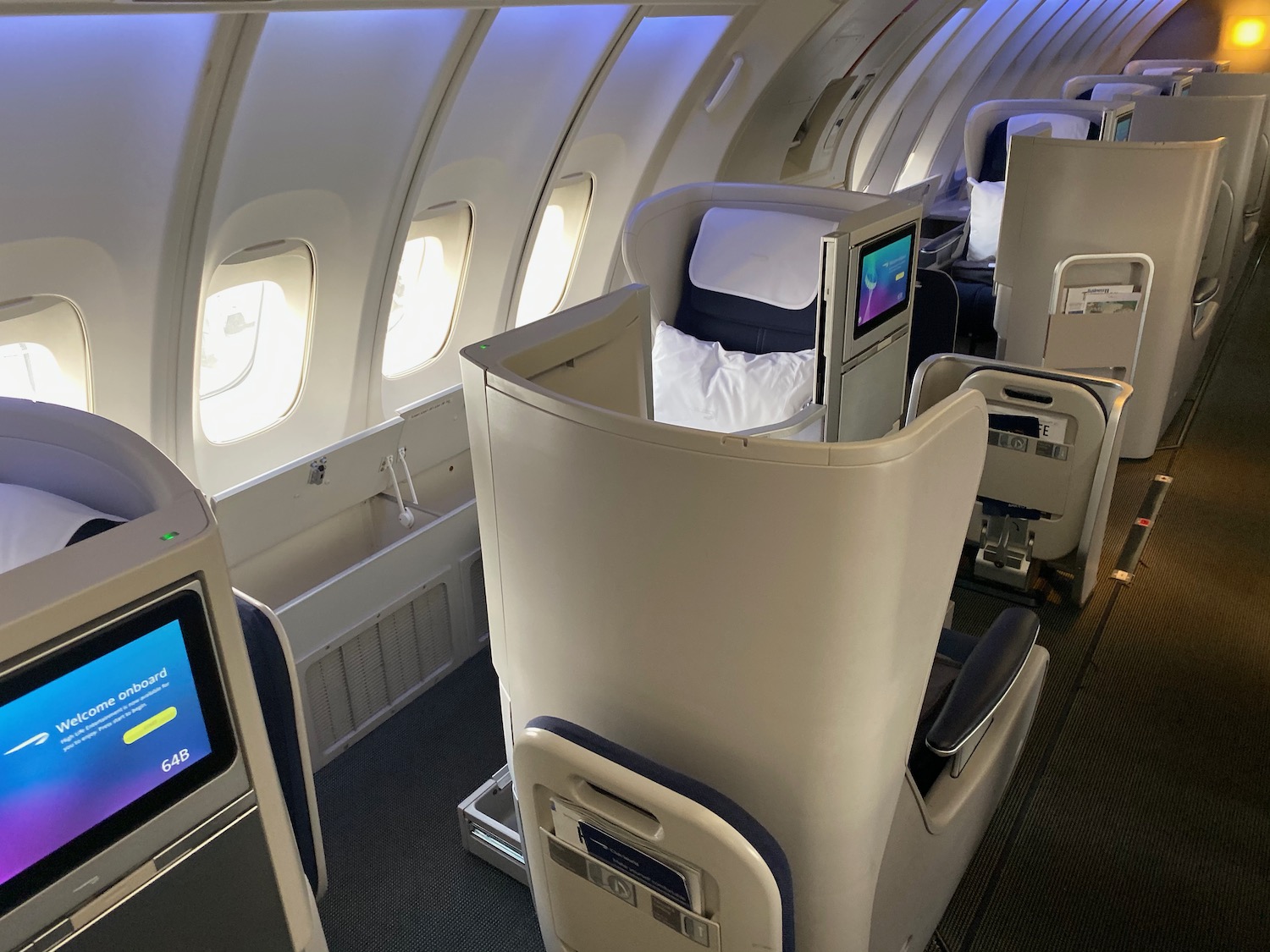 a plane with seats and a screen