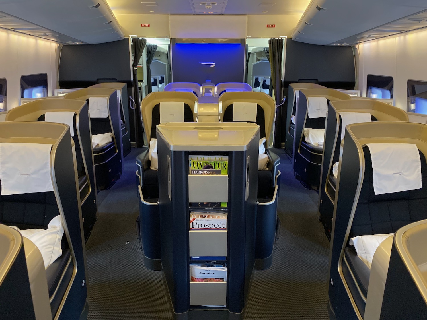 a room with rows of seats and a blue light